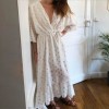 Robe longue blanche et or
